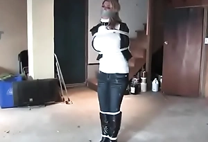 Carissa bound and gagged in boots