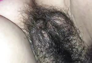 He cums on her hairy fluff