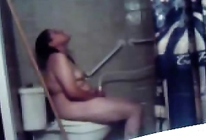 Hidden cam catches great masturbation of my mom forth toilet